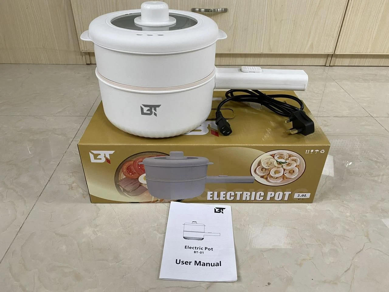 BT Electric Cooking Pot 2.0L Multifunctional Non-Stick Cooker with Steamer & Glass Lid – Portable Hot Pot for Home & Dorm Use